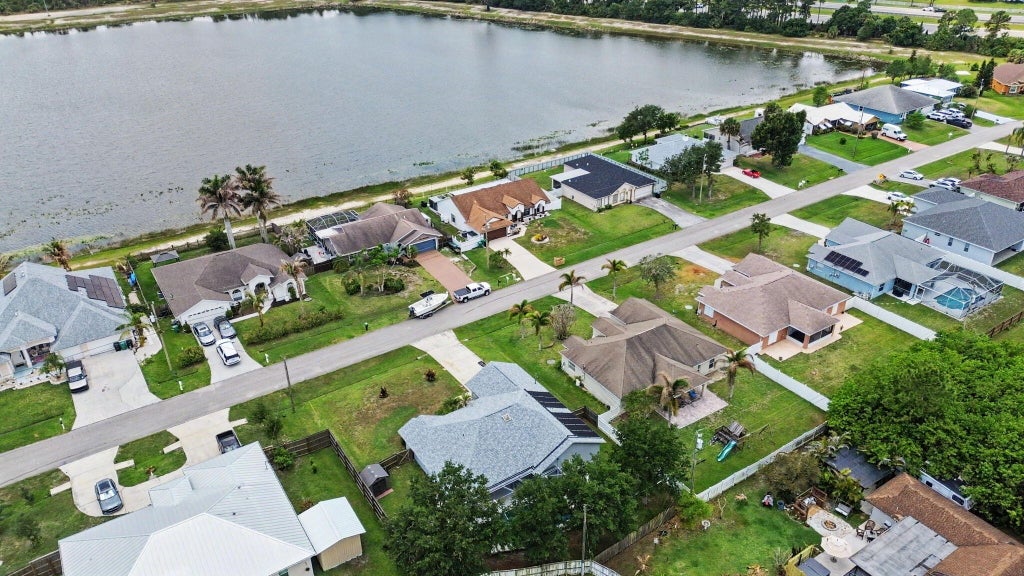 Photo of 2373 SW Santana Avenue, Port Saint Lucie, FL 34953 (MLS # B26028077)
