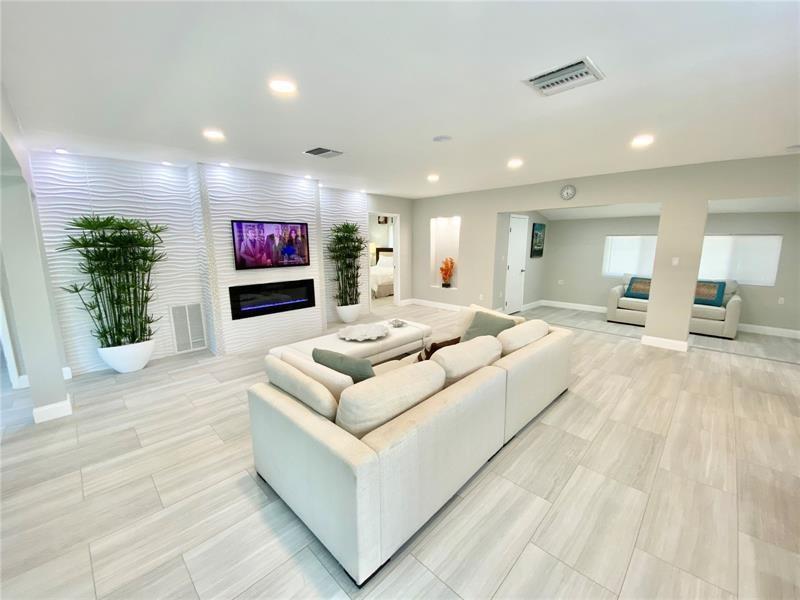 Excellent location in Pompano Isles, east of US-1! This 4 bedroom, 3 bathroom, corner-lot home is less than half a mile from the stunning Pompano Beach Pier, beaches, shopping, dining, schools, and bus stops. Enjoy an open floor plan with a gourmet kitchen, laminate flooring, and bright living spaces. Private yard for entertaining, brand new pool heater, plenty of parking, and a carport. Smart home with Wi-Fi–controlled lights and thermostat. Rents mostly or fully furnished. Tenant responsible for utilities. No cats; dogs welcome. Available immediately with first, last & security; 700 credit minimum.