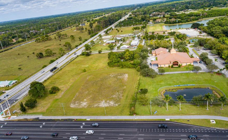 5.38-acre prime commercial site at the signalized hard corner of Southern Blvd and Seminole Pratt Whitney Rd in Wellington, FL. This premier high exposure location offers 92,000+ vehicles per day and has strong frontage on two major arterials. Ideally suited for retail, restaurant, medical, or mixed-use development, the site benefits from nearby growth and expansion including Westlake by Minto (4,500+homes). Popular nearby attractions include Wellington National Golf Club, Lion Country Safari, and iTHINK Financial Amphitheatre.Zoned General Commercial, with public utilities nearby and excellent visibility.  This property represents a rare opportunity to secure one of Palm Beach County's most active and desirable development corridors.