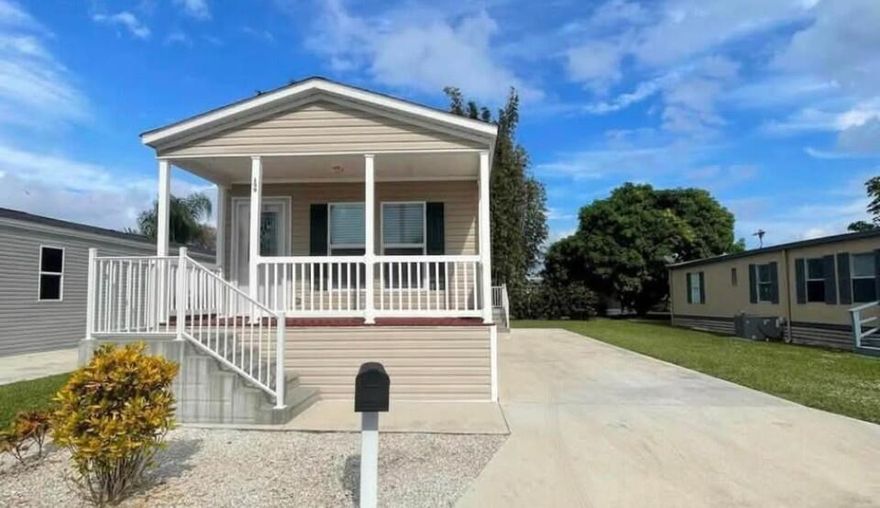OWNER FINANCING for qualified buyer! Welcome to Sandhill Shores in Fort Pierce! This well-maintained mobile home on leased land features a bright open floorplan designed for comfortable living and entertaining.  The spacious kitchen is the heart of the home, complete with a center island, ample cabinetry, and generous counter space—perfect for cooking, gathering, and everyday convenience.  Sandhill Shores offers a vibrant lifestyle with amenities including a clubhouse, heated pool, shuffleboard courts, and a full calendar of social activities. Enjoy a friendly, active community in a peaceful setting.  Conveniently located just minutes from shopping, dining, and Fort Pierce's beautiful beaches, this home is ideal for seasonal or full-time living Commercial oven belongs to tenant.  Home will be sold with original freestanding stove.