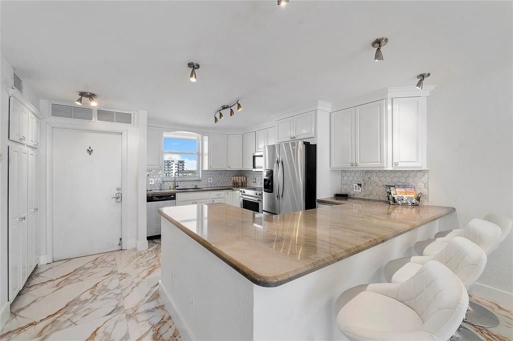 Photo of 3100 NE 49th Street #Unit 807, Fort Lauderdale, FL 33308 (MLS # B26045516)