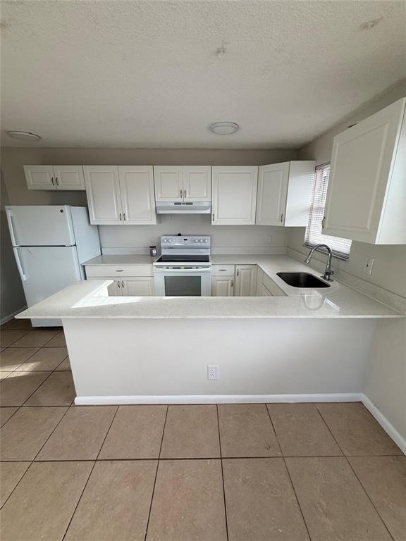 Photo of 1235 W RIVER Drive #4, Margate, FL 33063 (MLS # B26080293)