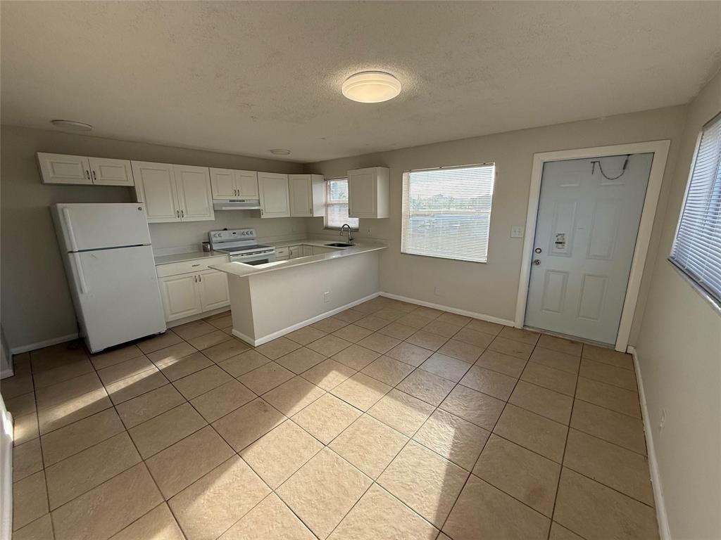 Photo of 1235 W RIVER Drive #4, Margate, FL 33063 (MLS # B26080293)