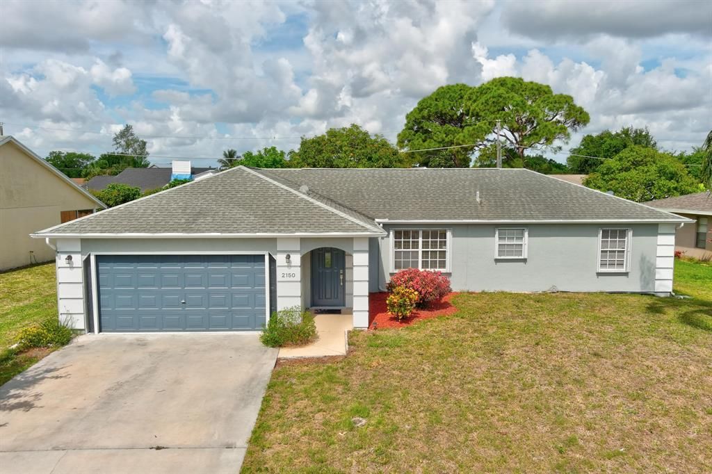 Photo of 2150 SE Dolphin Road, Port Saint Lucie, FL 34952 (MLS # R10715057)