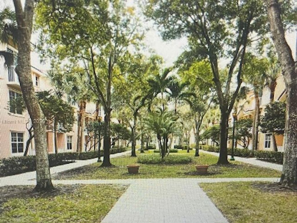 Photo of 4850 Chancellor Drive #22, Jupiter, FL 33458 (MLS # R11071573)