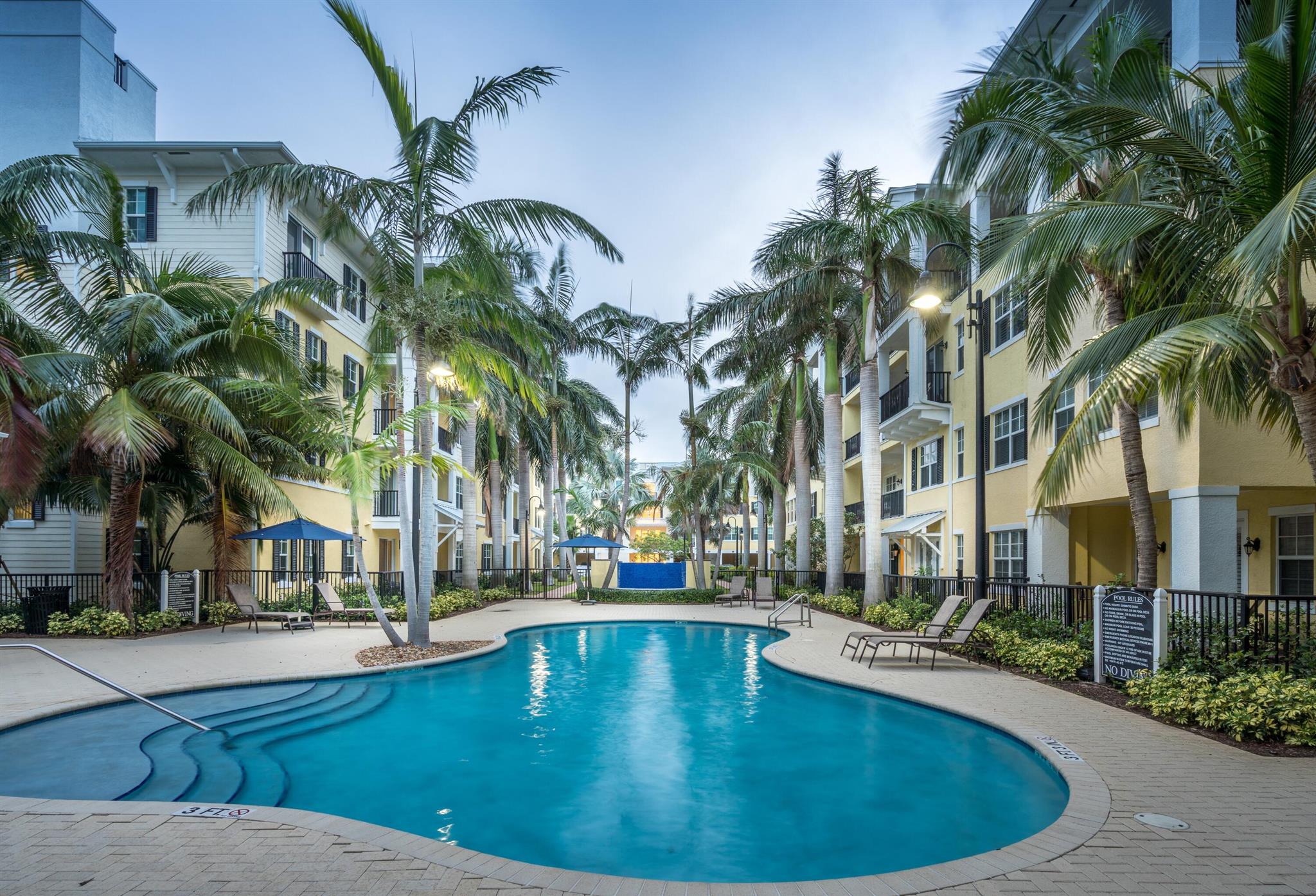 CLOSE TO BEACH! Luxury 3/2 top floor unit is located just minutes to downtown Delray, shops, restaurants and the beach. This ''Calder'' model features modern finishes with upscale cabinets, open kitchen w/stainless steel appliances, large walk-in closet, separate laundry room with full size washer/dryer, large private balcony, hurricane impact glass and 10' ceilings. Other features: access-controlled buildings with secure entry and interior elevators. The properties first-class amenities include: a resort style pool and cabana, a putting green, and a half basketball court. Come see this very desirable east Delray Beach Location. NO SHORT TERM RENTALS. Pets Welcome!