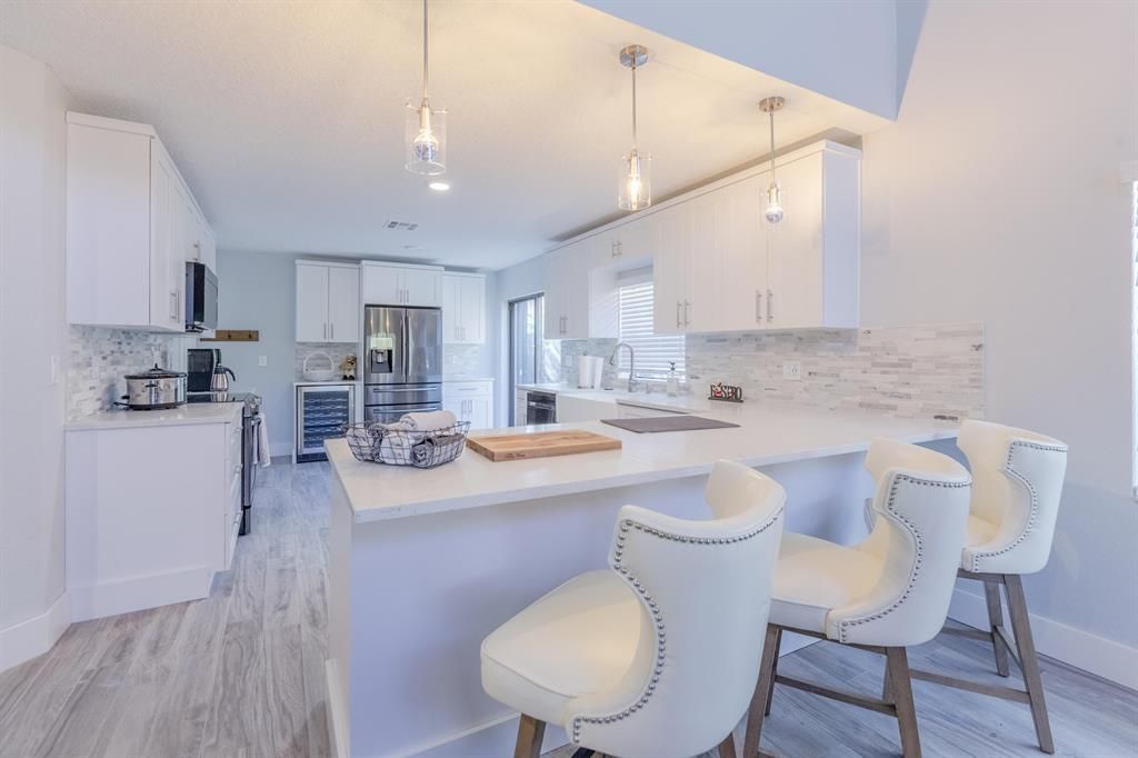 Photo of 2596 La Cristal Circle, Palm Beach Gardens, FL 33410 (MLS # R10703183)