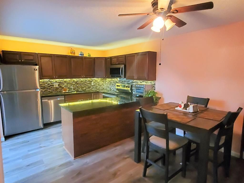 Photo of 6445 Red Pine Lane #A, Green Acres, FL 33415 (MLS # R10774544)