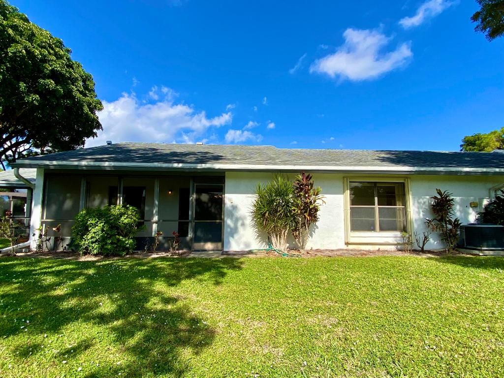 Photo of 6117 Woodlake Boulevard, Greenacres, FL 33463 (MLS # R11139595)