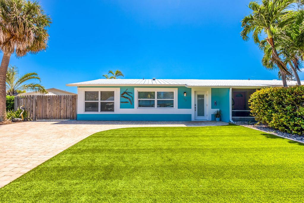 Photo of 113 N Las Olas Drive, Jensen Beach, FL 34957 (MLS # R11078865)