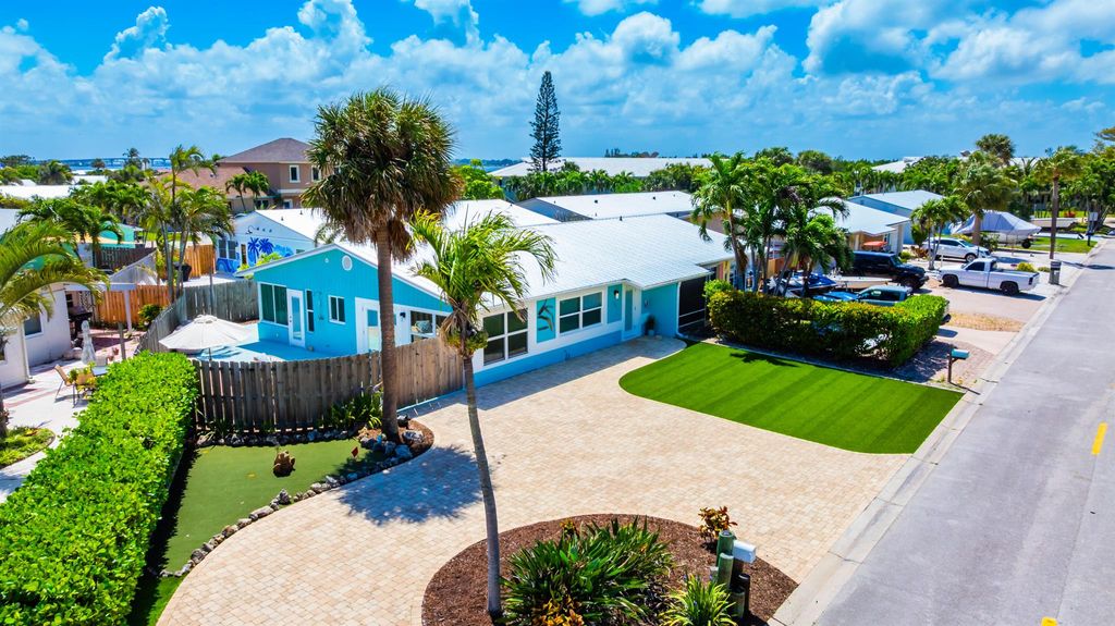 Photo of 113 N Las Olas Drive, Jensen Beach, FL 34957 (MLS # R11078865)