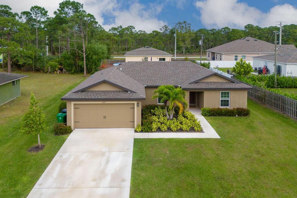 Photo of 2581 SE Dogwood Avenue, Port Saint Lucie, FL 34952 (MLS # R10948651)