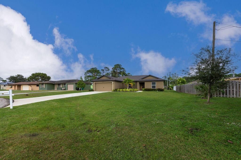 Photo of 2581 SE Dogwood Avenue, Port Saint Lucie, FL 34952 (MLS # R10948651)