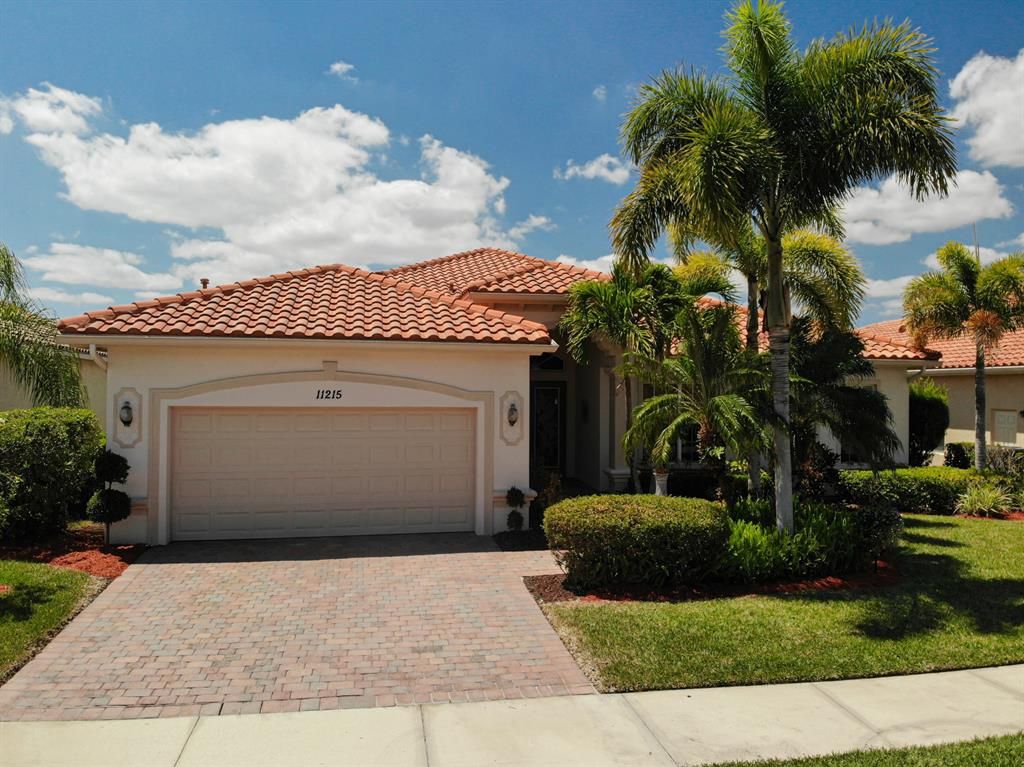 Photo of 11215 SW Apple Blossom Trail, Port Saint Lucie, FL 34987 (MLS # R10707269)