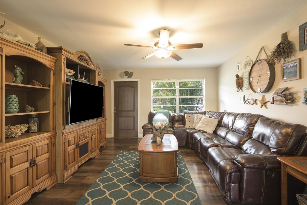 Photo of 1301 SE Sand Dollar Lane, Stuart, FL 34996 (MLS # R10995800)