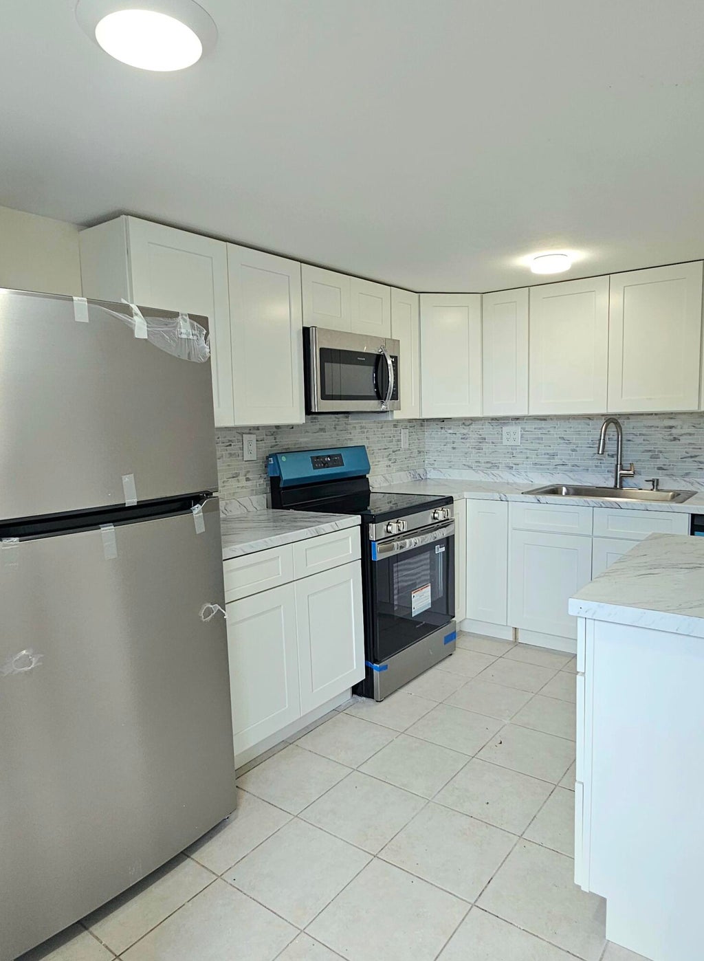 Photo of 1501 Crescent Circle #E44, Lake Park, FL 33403 (MLS # R11132416)