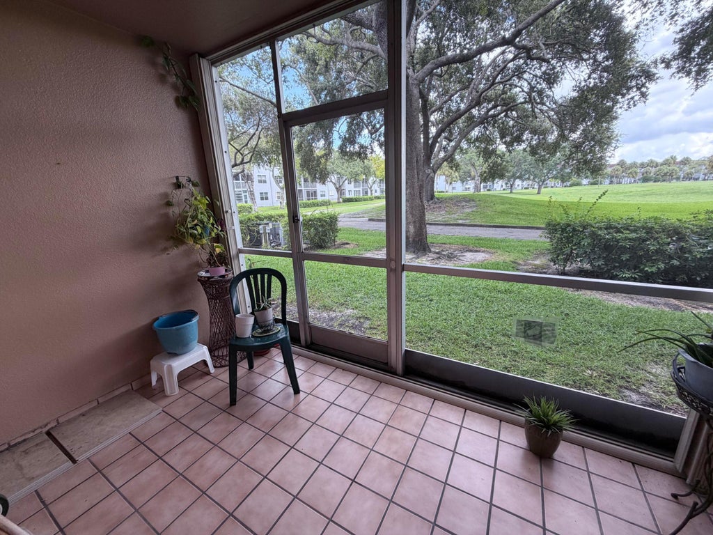 Photo of 1300 SW 125TH Avenue #103K, Pembroke Pines, FL 33027 (MLS # B26067050)
