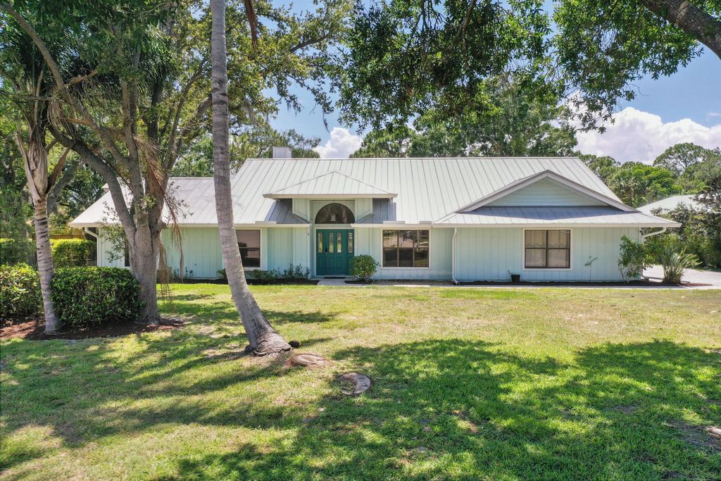 Photo of 1146 SW Magnolia Bluff Drive, Palm City, FL 34990 (MLS # R10889379)