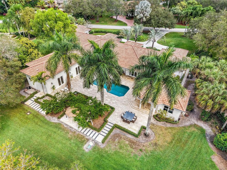 The Ultimate dream home you’ve always been waiting for—an exquisitely renovated estate in prestigious Windmill Ranch Estates that defines luxury living on a private 1.78-acre oasis. Bathed in natural light through high-impact windows and doors, it offers stunning views of manicured grounds and a resort-style pool. The expansive master suite is a serene retreat with a sitting area, custom walk-in closet with onyx countertops, and spa-like his-and-hers baths. The gourmet kitchen with top-tier appliances flows into elegant living spaces. A state-of-the-art game room, butler’s pantry, executive office, and 1-bed, 1-bath guest house with a summer kitchen elevate the lifestyle. This is an exclusive masterpiece just waiting for you!