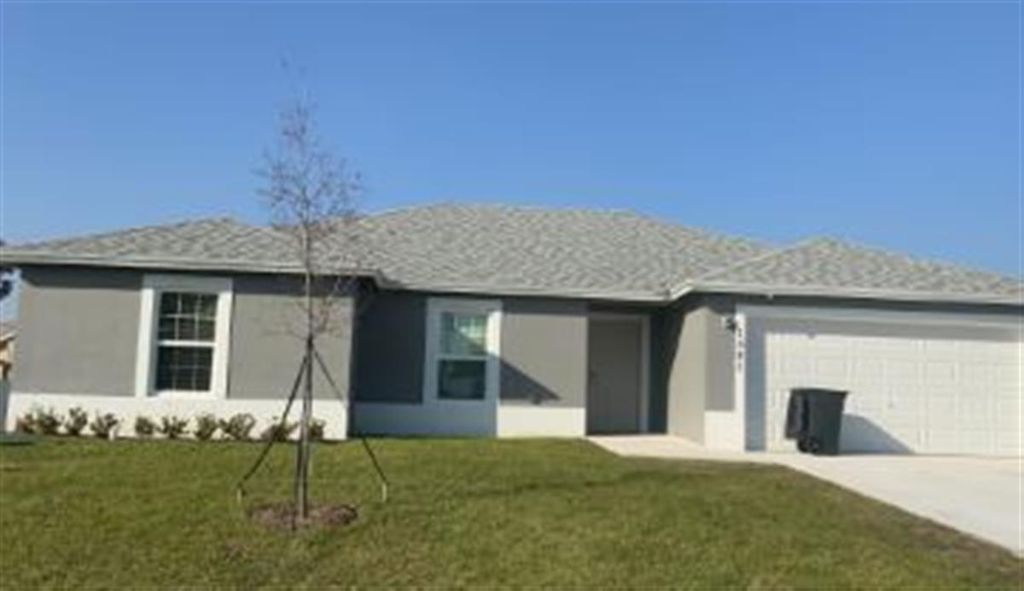 Photo of 1581 SW Apricot Road, Port St Lucie, FL 34953 (MLS # R10903542)