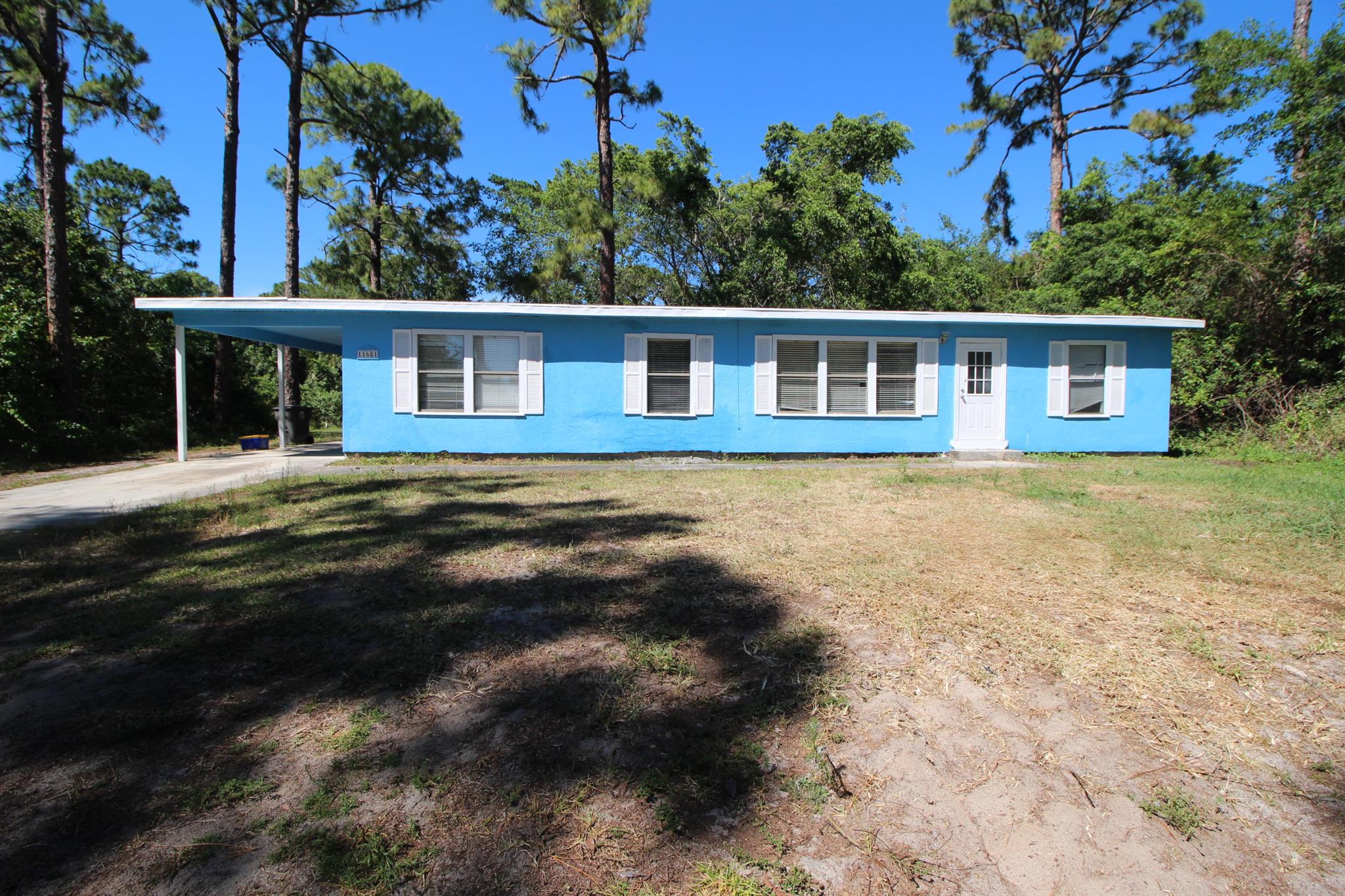 3 Bed / 2 Bath Single Family Home on 1 Acre in the in the desirable Acreage area of western West Palm Beach. This single-story home offers privacy, space, and freedom - with no HOA restrictions and a quick, easy application process.Enjoy a large open yard, private and serene setting, plus a carport for convenient covered parking. The home features a functional layout, with a screened-in back porch ideal for relaxing outdoors all year round.Highlights:3 Bedrooms / 2 Bathrooms1 Acre of LandNO Association Screened Back PorchSingle StoryEasy, Fast Application Process