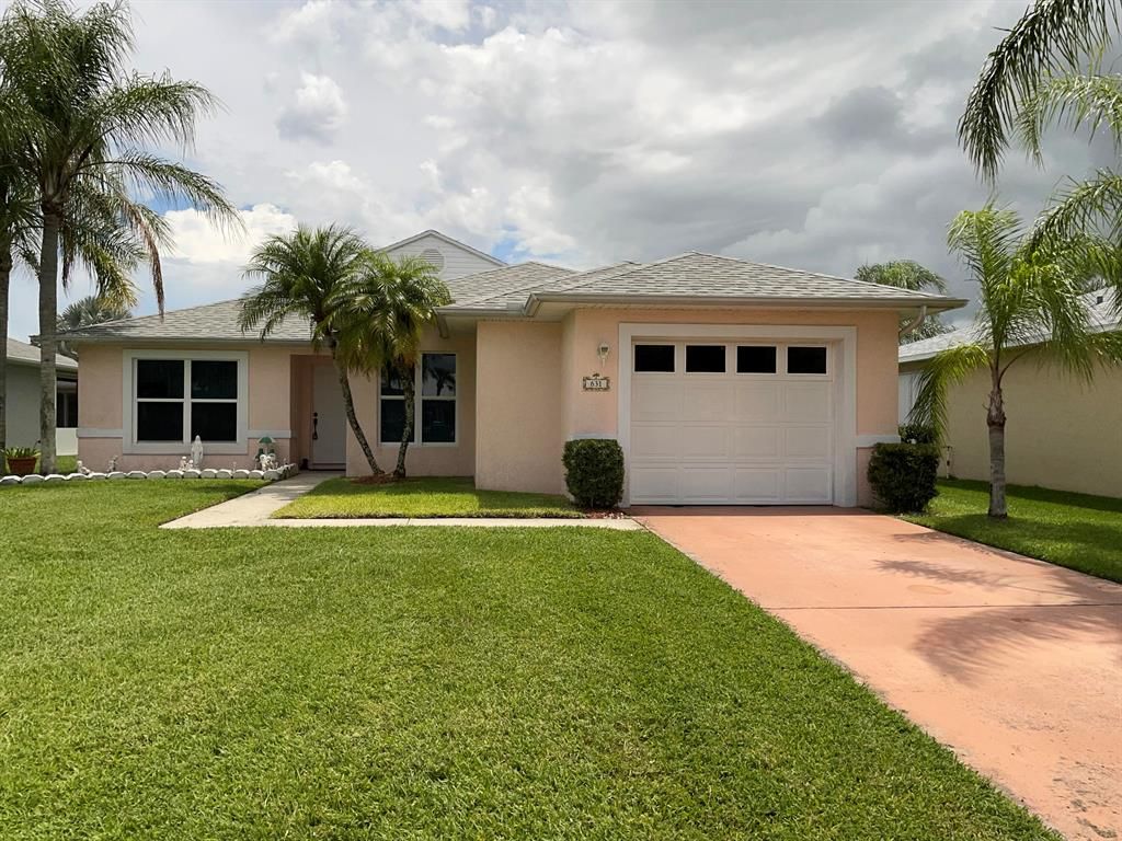 Photo of 631 Paurotis Lane, Fort Pierce, FL 34982 (MLS # R10813037)