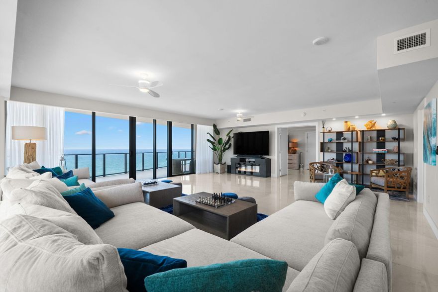 Rare opportunity to own one of the largest residences in Broward County perfect for large families, created from a seamless combination of three units at Sabbia Beach. Built in 2019 this direct oceanfront home offers 6 bedrooms, 7 full baths, and 2 half baths with 3 expansive living areas + office designed for both comfort and entertaining. Enjoy breathtaking 180-degree views of the Atlantic Ocean from approximately 1,500 sq ft of private terraces. Floor-to-ceiling glass fills the residence with natural light, while the open layout maximizes the panoramic waterfront setting. The primary suite is positioned within its own private wing, complete with a separate kitchen and dedicated laundry. Offered at a great price per square foot relative to comparable newer luxury oceanfront properties.