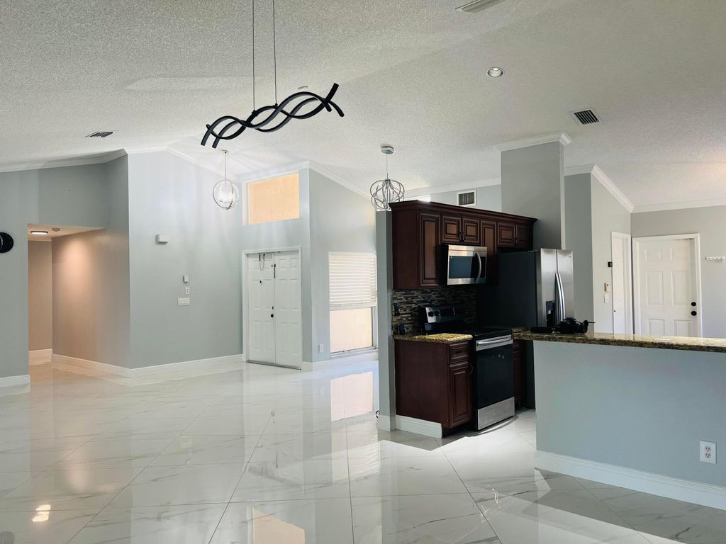 Photo of 12623 SW 8th Court, Davie, FL 33325 (MLS # B26003246)