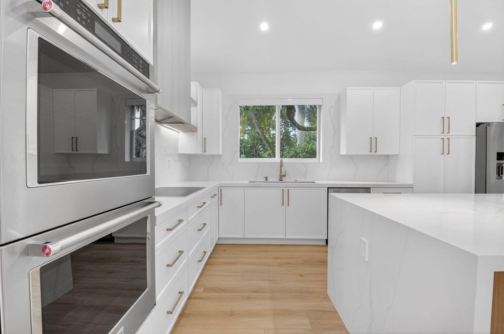 Photo of 5537 NW 21st Way, Boca Raton, FL 33496 (MLS # R11164674)