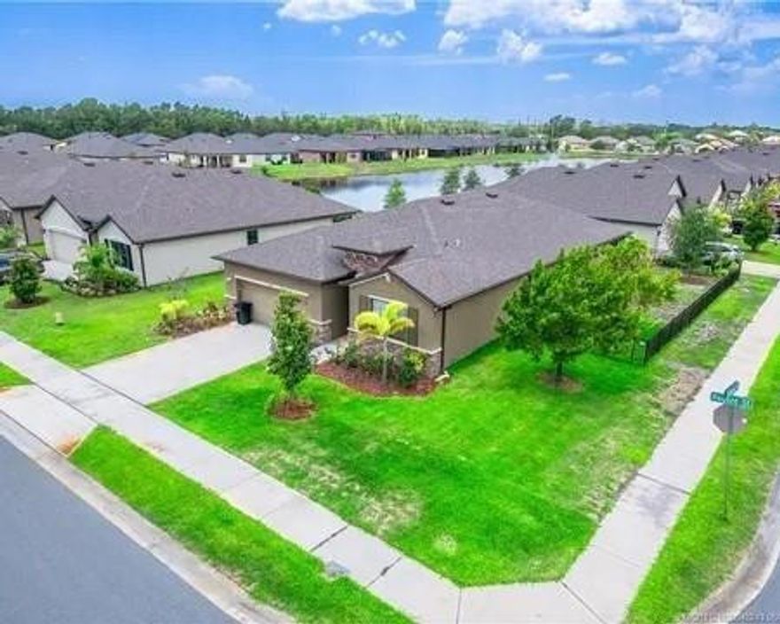 Delray floor plan is a 4 bedrooms, 2 baths plus Flex with 2034 sq ft of living space. The exterior of the home has a 23' x 9' lanai and an irrigation well for the sprinkler. Inside the home you'll find granite countertops in the Kitchen, 36'' upper cabinets and Moet sink. 18'' ceramic tile throughout and carpet in bedrooms. Home also equipped with energy saving features and hurricane shutters. Corner property faces the preserves...screened patio with a big Jac