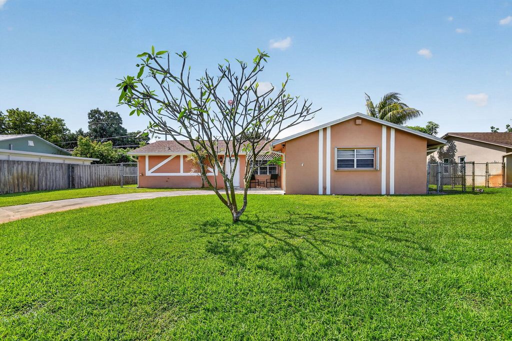 Photo of 3950 Aladdin Avenue, Boynton Beach, FL 33436 (MLS # B26015616)