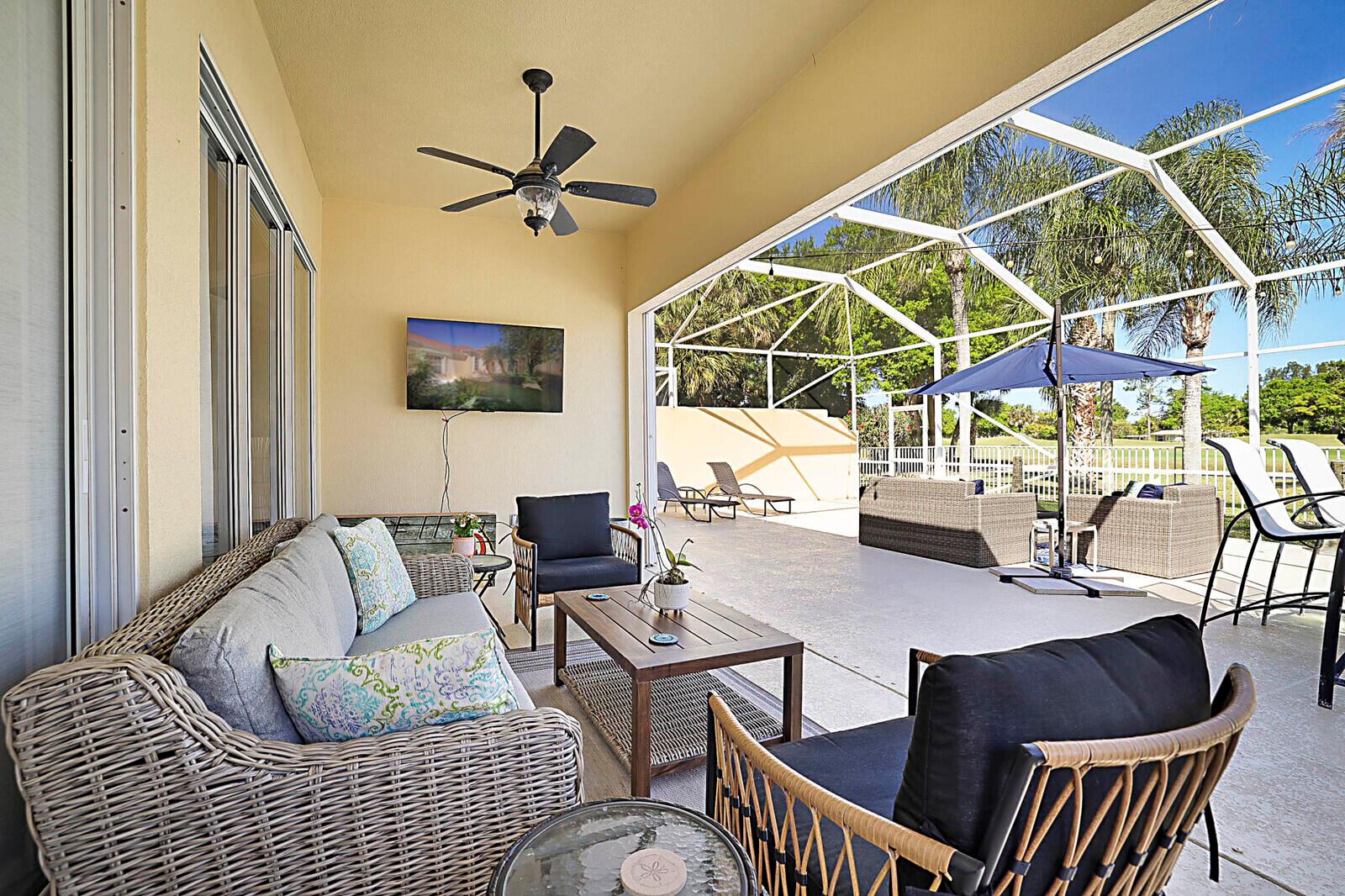 Welcome to the gated golf course community of The Florida Club, Stuart. Enter this lovely DiVosta quality-built home through a welcoming foyer into an open-concept layout that maximizes space and natural light. You'll appreciate the grandeur with 3 full bedrooms, 2.5 bathrooms, and an office. High ceilings, enhanced with crown molding and large windows, create an airy and inviting atmosphere throughout the house. The kitchen has stainless steel appliances and features granite countertops. A new metal roof and easy-close shutters offer 100% storm protection. This property features a 1,000-square-foot screened-in lanai, providing the perfect spot for relaxing & entertaining anytime of the day while enjoying your picturesque golf course view.