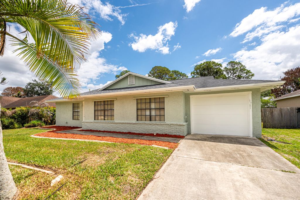Photo of 1781 SW Cloverleaf Street, Port Saint Lucie, FL 34953 (MLS # B26019350)