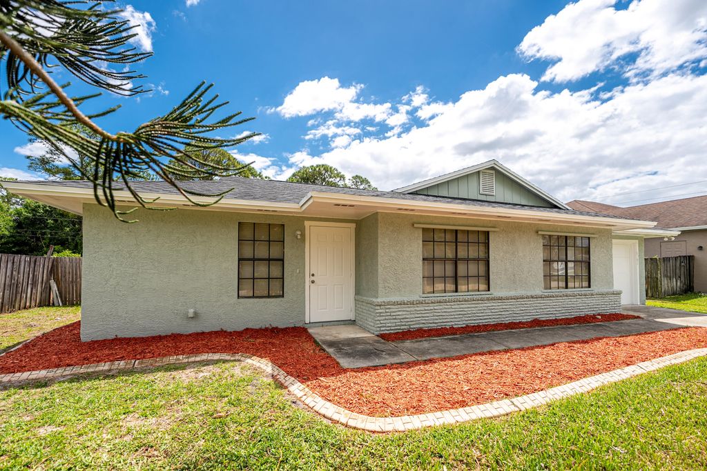 Photo of 1781 SW Cloverleaf Street, Port Saint Lucie, FL 34953 (MLS # B26019350)