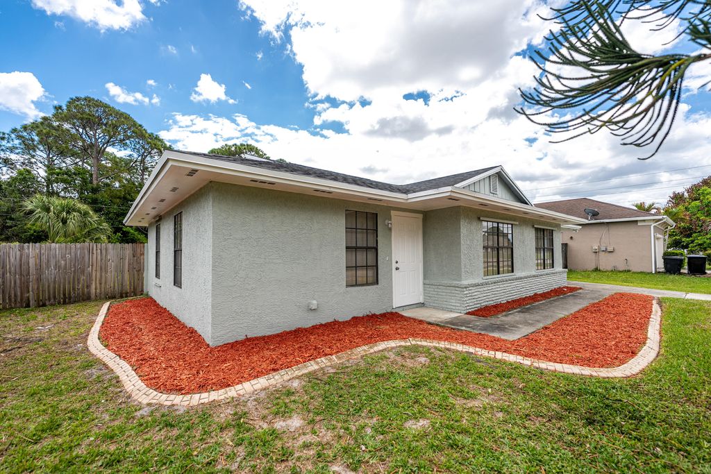 Photo of 1781 SW Cloverleaf Street, Port Saint Lucie, FL 34953 (MLS # B26019350)