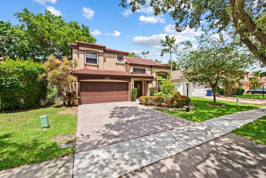 Don't miss this incredible opportunity to own a beautifully updated home in one of Southwest Broward's premier gated communities. This move-in ready 3-bedroom, 2.5-bath residence features a 2022 roof, all copper plumbing, and a 4-year-old A/C system for added peace of mind.The home offers an open-concept kitchen perfect for entertaining, a spacious 2-car garage, and full accordion hurricane shutters throughout. The primary suite and bathroom are conveniently located on the first floor, along with an additional half bath for guests. Enjoy family gatherings year-round on the large screened-in patio. Residents enjoy the security of three separate 24-hour manned gates and access to resort-style amenities including a pool, fitness center, tennis courts, pickleball, basketball, and playgrounds.