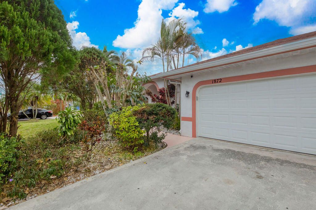 Photo of 1872 SW Airoso Boulevard, Port Saint Lucie, FL 34984 (MLS # R11146457)