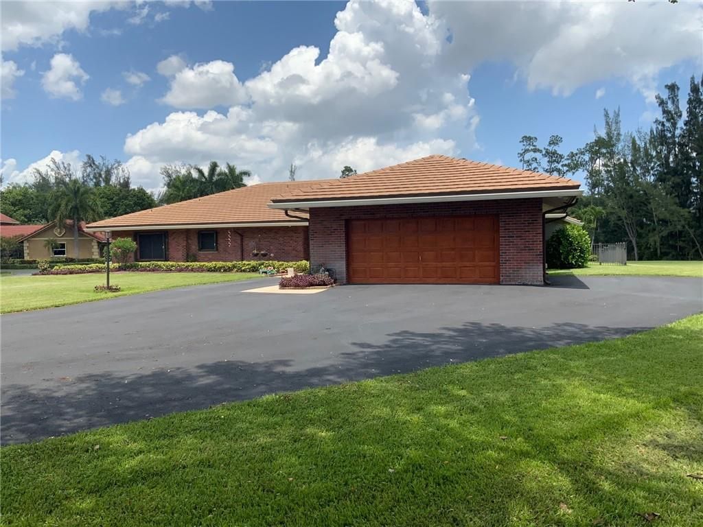 Photo of 11330 Timberlodge Terrace, Boca Raton, FL 33428 (MLS # F10387982)