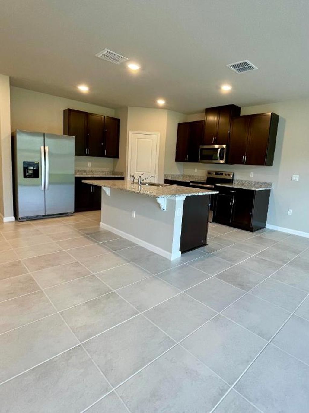 Photo of 5722 SE Edgewater Circle, Stuart, FL 34997 (MLS # R10974662)