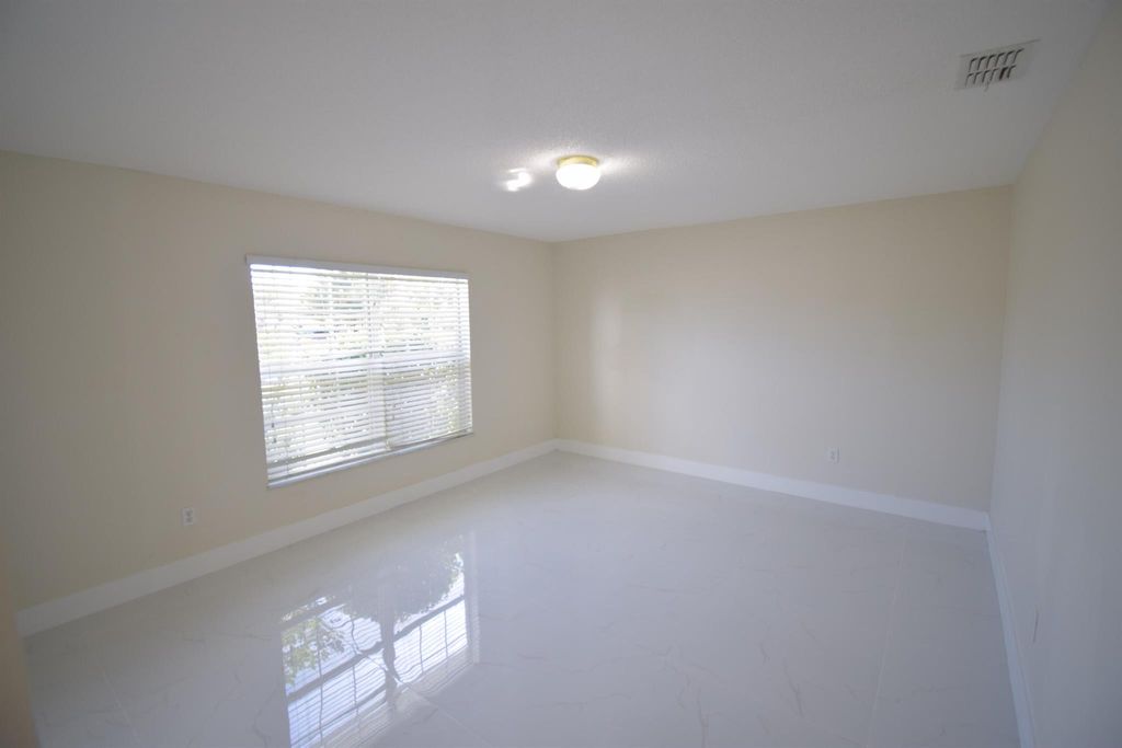 Photo of 2198 SW Cameo Boulevard, Port Saint Lucie, FL 34953 (MLS # R11056965)