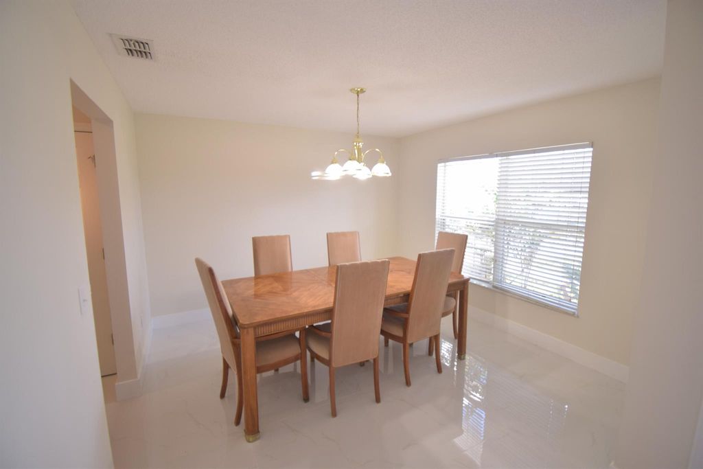 Photo of 2198 SW Cameo Boulevard, Port Saint Lucie, FL 34953 (MLS # R11056965)