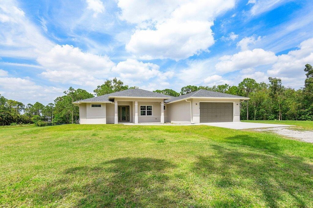 Photo of 18713 92nd Lane N, Loxahatchee, FL 33470 (MLS # R10983437)