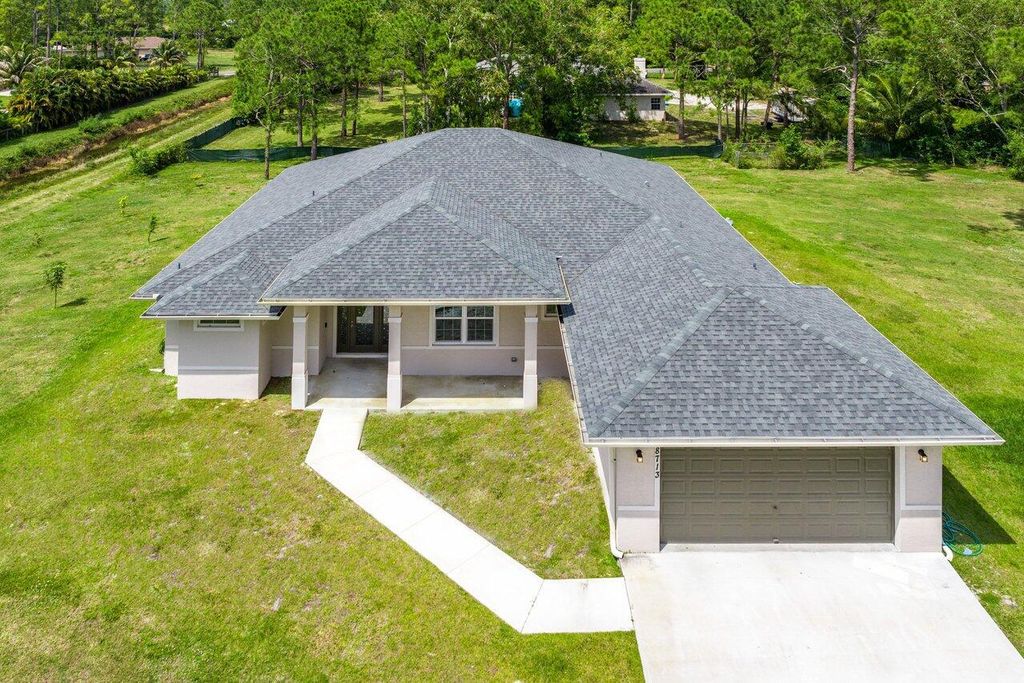 Photo of 18713 92nd Lane N, Loxahatchee, FL 33470 (MLS # R10983437)