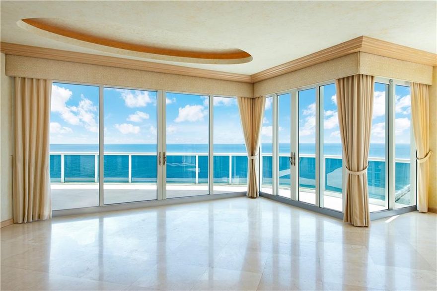 Direct Oceanfront Penthouse with amazing SE oceanfront views.  Luxury living on the sand.  Views from every room.  Open floor plan, 10 to 11 foot ceilings, 3 bedrooms with office, floor to ceiling impact windows with private foyer.  Resort style amenities include 10 acres of oceanfront, concierge, valet, guard gated, 24 hr. security, pools & spa, tennis courts, fitness center, business center, poolside café, private beach pavilion,  and pet friendly.  Walk to shops and restaurants.  Must see.  Estate Sale.