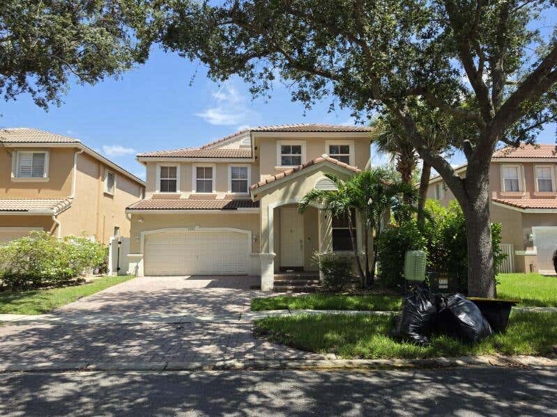 Photo of 5292 Sancerre Circle, Lake Worth, FL 33463 (MLS # B26067589)