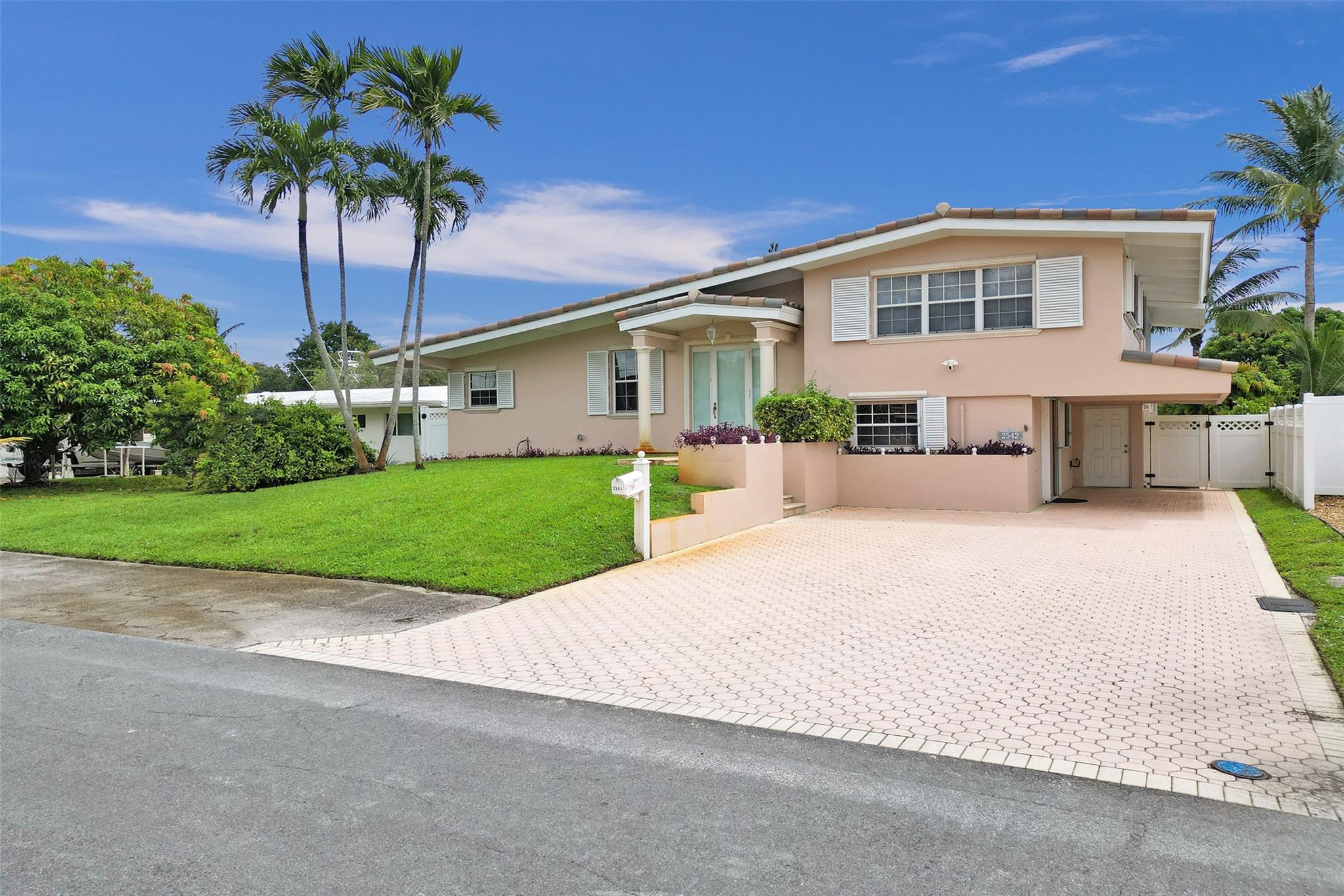 Here is a great opportunity to own a piece of boater's paradise in Lauderdale Isles. Just 40 minutes by boat to the ocean and only 20 minutes to Las Olas, dock-to-dock! Centrally located with easy access to I-595, I-95, and the Turnpike, placing you minutes from the Hard Rock, airport, and Downtown. This home features 3 bedrooms + bonus room/office, 2 bathrooms, and a custom pool & spa on 65' of deep water ocean access with no fixed bridges. Additional upgrades and features include a 2023 tile roof, full storm protection, 2-level screened in porch providing nearly 800sqft of additional covered space overlooking the water and your private tropical oasis, 50' dock and shore power post w/ 30amp, 50amp, and 115v outlets to accommodate any boat. PUBLIC BOAT RAMP & PARK RIGHT AROUND THE CORNER!