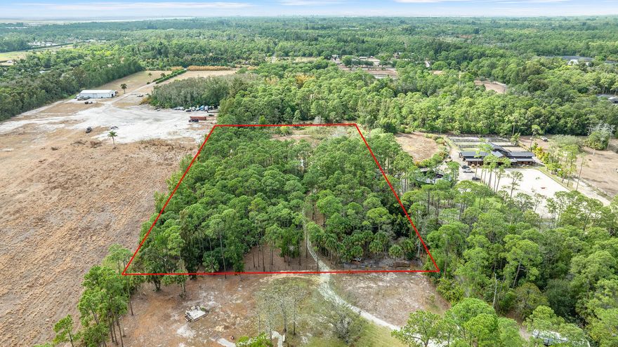 This exceptional 5-acre parcel offers a rare opportunity to own peaceful, usable countryside acreage in a truly private setting. Partially cleared with natural wooded areas remaining for beauty and seclusion, the land is ideal for a peaceful retreat or creating your dream farm. The property is fully fenced along the perimeter and features a beautiful pond. Enjoy wide-open space, abundant wildlife, and the tranquility of rural living, all while being conveniently located near Wellington's world-class equestrian amenities and nearby town conveniences. A unique chance to secure premium acreage with endless potential. This offering if for the back (West) half of the current parcel with is composed of two unified 5 acre parcels.  There is a house on the front 5 acres.  The property will be subdivide at Closing.  An access easement to the back parcel will be placed on the front (East) parcel.  Because the 5 acres is currently unified with the front 5 acres the taxes, size, measurements and address are all estimated.