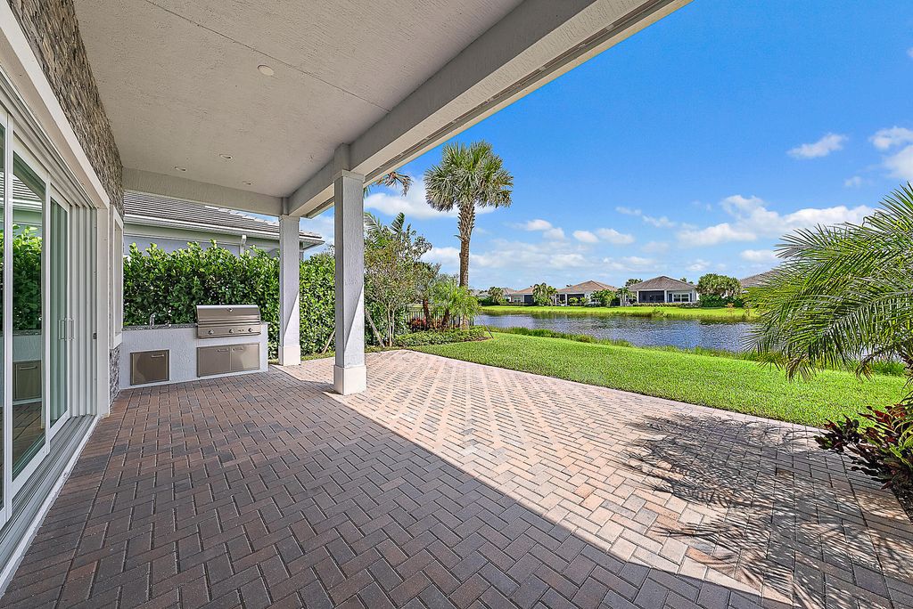Photo of 9976 Seagrass Way, Palm Beach Gardens, FL 33412 (MLS # R11098639)