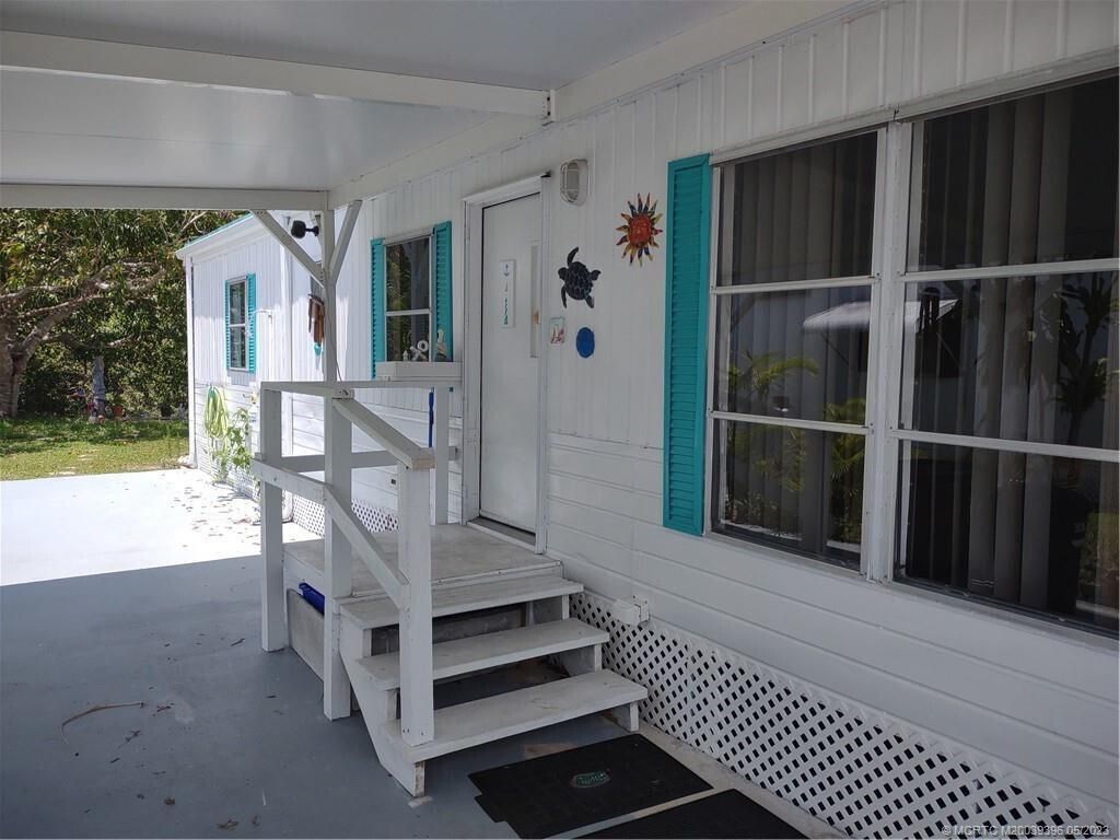 Photo of 6 Mediterranean Lane N, Port Saint Lucie, FL 34952 (MLS # R10952284)