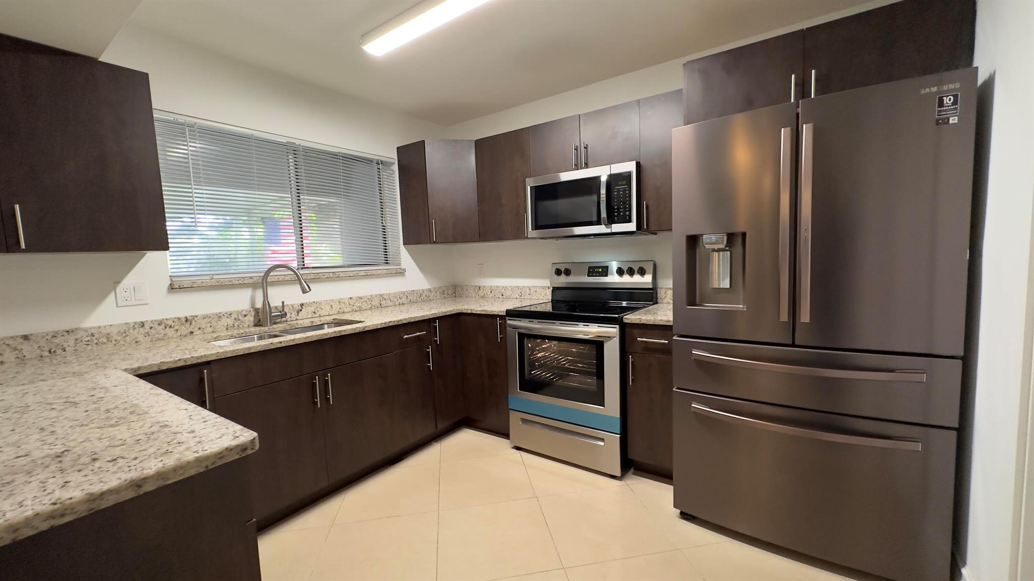 RENOVATED TOWNHOME FEATURING 1193 SQ FEET THREE BEDROOMS AND ONE AND A HALF BATHS. KITCHEN OFFERS ESPRESSO CABINETS WITH GRANITE COUNTERTOPS, ISLAND AND STAINLESS APPLIANCES. TILE THROUGHOUT FIRST FLOOR AND WOOD LAMINATE ON SECOND. SLIDERS OPEN TO A LARGE SCREENED IN PATIO. ONE CAR GARAGE AND ONE ASSIGNED PARKING PLACE PLUS ADDITIONAL GUEST PARKING. PET FRIENDLY. WATER AND CABLE INCLUDED.